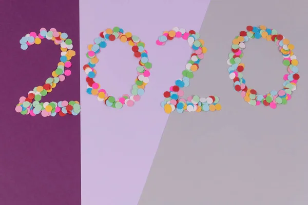 Inscription of 2020 number made of multi-colored round confetti s — Stock fotografie