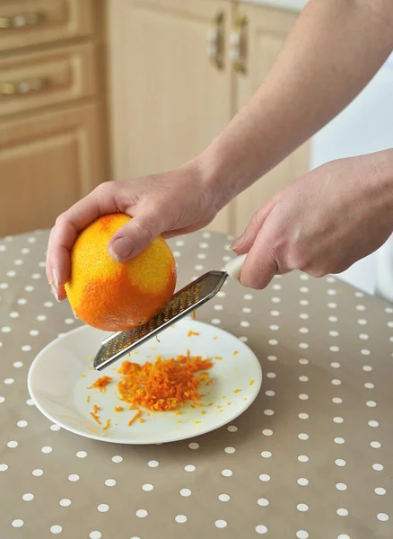 Closeup Woman Rubbing Orange Zest Grater — Stock Photo, Image