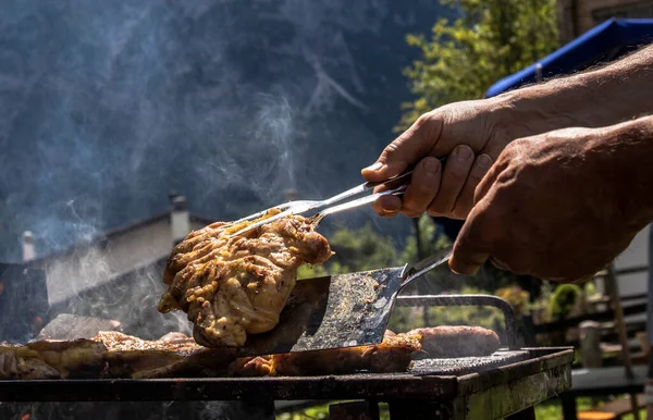 Barbecue with friends in the mountains