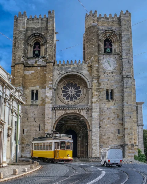 Lisbon Cathedral of St. Mary Major (Se de Lisboa) and Yellow Tram, Lisbon, Portugal