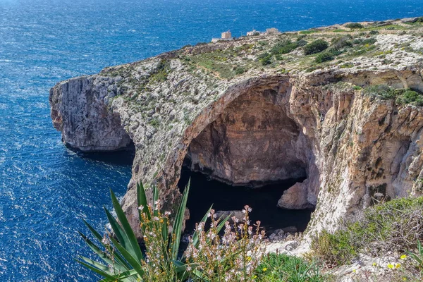 Natural stone arch and sea caves, Blue Grotto, Malta