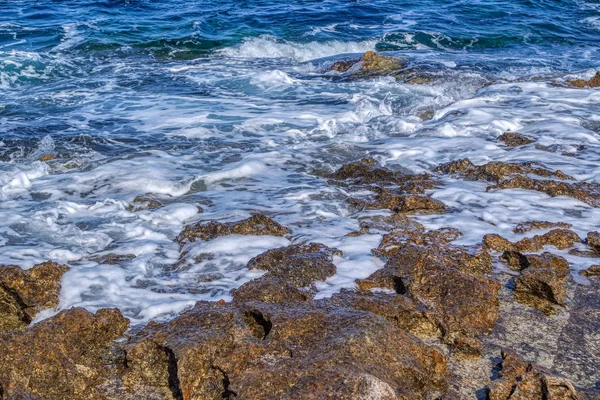 Sea stones rocks washed by sea in Bugibba, Malta — Stock Photo, Image