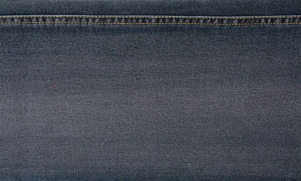 Mavi Denim Jeans doku dikiş, Denim kumaş arka plan ile. 