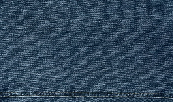 Mavi Denim Jeans doku dikiş, Denim kumaş arka plan ile. 