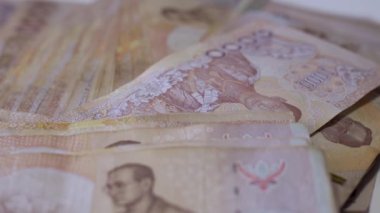 Yakın Tayland para banknotları closeup arka plan, iş için Tayland para, sikke. 1000 görev butts