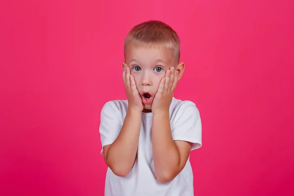 Very Cute Young Surprised Boy White Shirt Looks Camera Holding — Stock Photo, Image