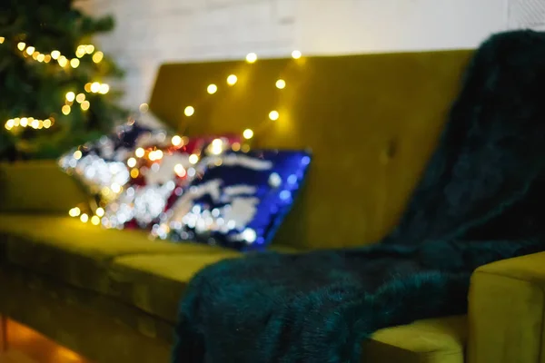 Beautiful holiday decorated room with Christmas tree, out of focus shot for photo background.