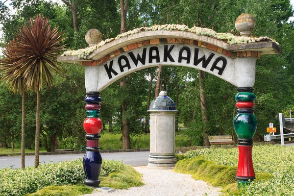 An ornate sign welcoming people to Kawakawa, a small town in the Bay of Islands, New Zealand