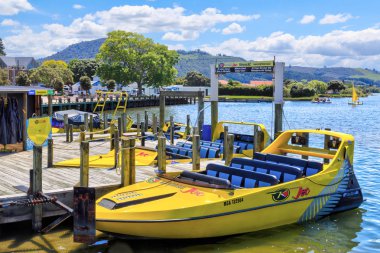 Jet boats on Lake Rotorua, New Zealand. These craft take tourists on high-speed thrill rides on the lake. Photographed November 23 2018 clipart