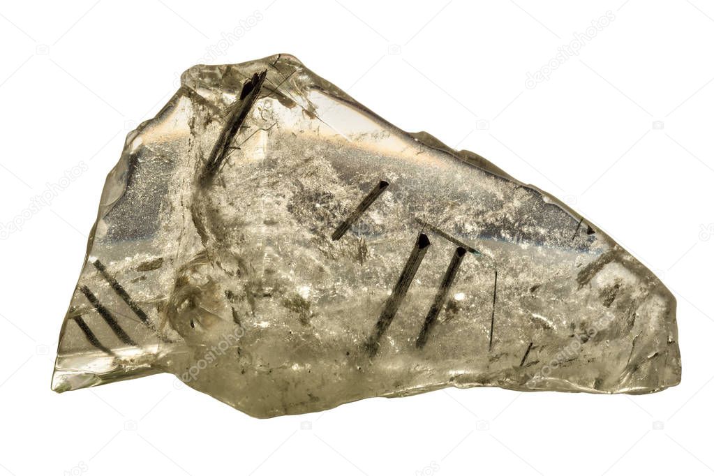 A large piece of clear quartz, with rods of black tourmaline running through it. Isolated on white background