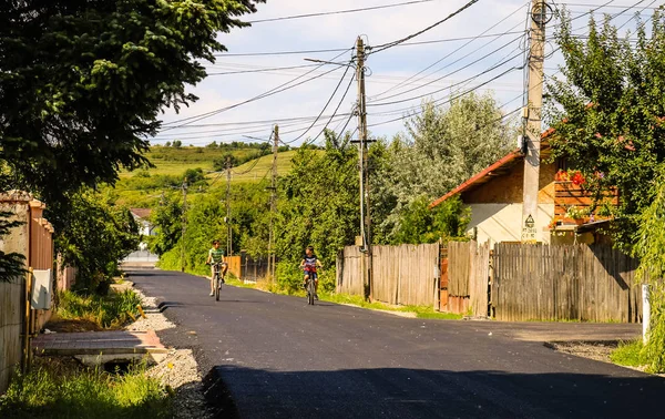 Targoviste, Romania - 2019. Happy children riding bikes on the n — Stock Photo, Image