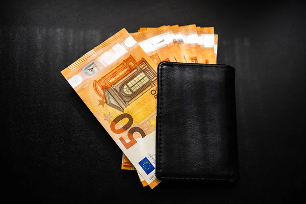 Man wallet with money on the table, wallet with EURO