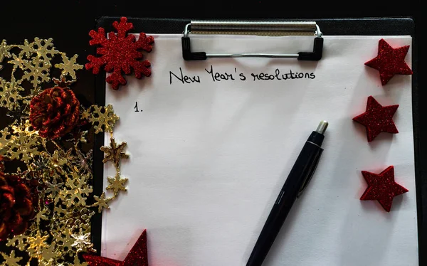 Piszę noworoczne postanowienia na święta. Boże Narodzenie Resoluti — Zdjęcie stockowe