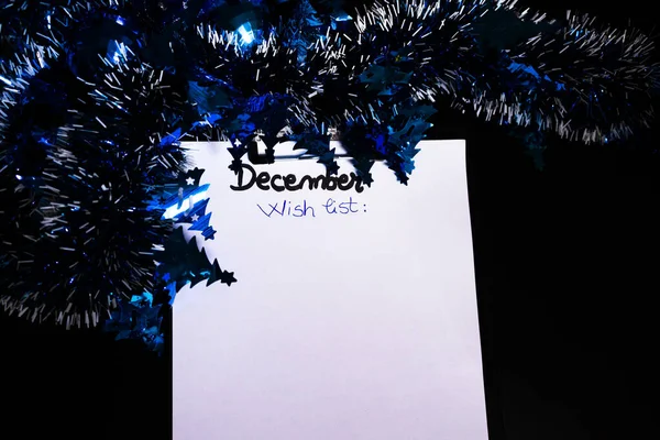 Writing Christmas wishes. Christmas wishes list. Text December w