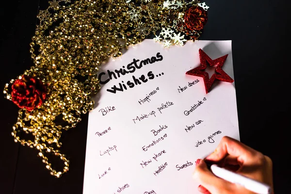 Writing Christmas wishes. Christmas wishes list. Text Christmas