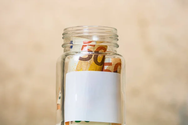 Composição Com Poupança Notas Dinheiro Euros Frasco Vidro Com Rótulo — Fotografia de Stock