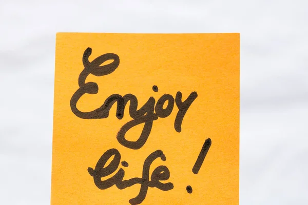 Enjoy Life Handwriting Text Close Isolated Orange Paper Copy Space — Stock Photo, Image