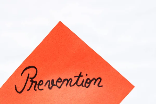 Prevention Handwriting Text Close Isolated Orange Paper Copy Space Writing — Stock Photo, Image
