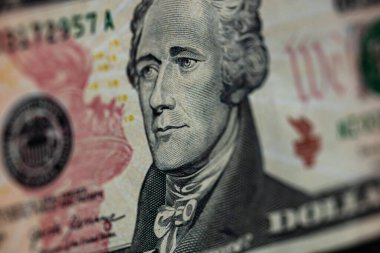 10 dolarlık banknotun detaylarına odaklan. Para banknotlarının makro detaylarını kapat, dolarları izole et. Dünya para kavramı, enflasyon ve ekonomi kavramı