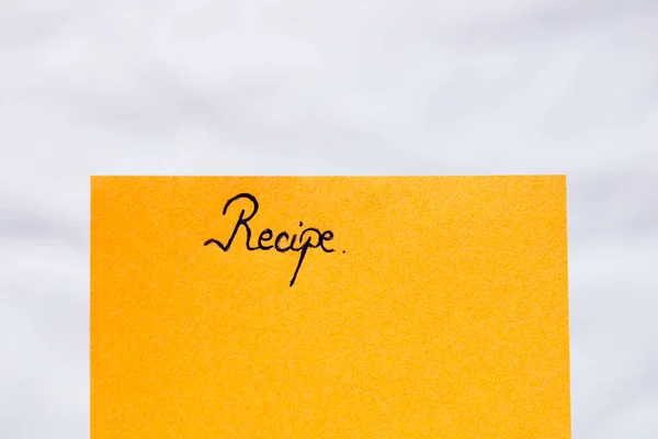 Text Rukopisu Recept Zavřít Izolované Oranžovém Papíru Kopírovacím Prostorem — Stock fotografie