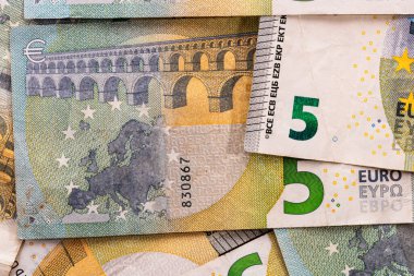 5 Avro banknotları. Tasarruf, gelir veya yatırımı temsil eden Avro para arkaplanı