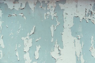 Çatlak açık mavi duvar arkaplanı dokusu. Eski çatlak arkaplan.