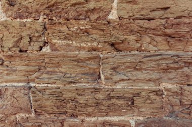 Kahverengi tuğla duvar açık arka plan. Taş doku.