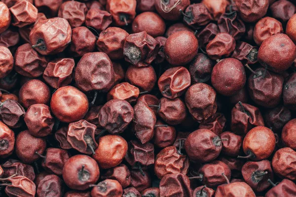 Close Up of Red dried jujube. Ziziphus mauritiana, also known as Chinese date, ber, Chinee apple, jujube, Indian plum, Regi pandu, Indian jujube, dunks (in Barbados) and masau