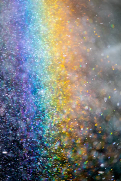 Abstração, arco-íris em gotas de água. Fundo natural ou textura — Fotografia de Stock