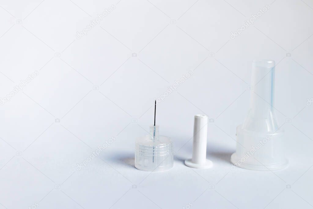 Insulin pen needles isolated on white background close up. Diabetes concept. Insulin injection needle 3.5 mm.