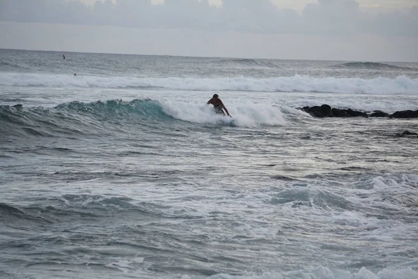 Surfers Catch Some Final Waves Early Evening Poipu Beach Kauai — Stock Photo, Image