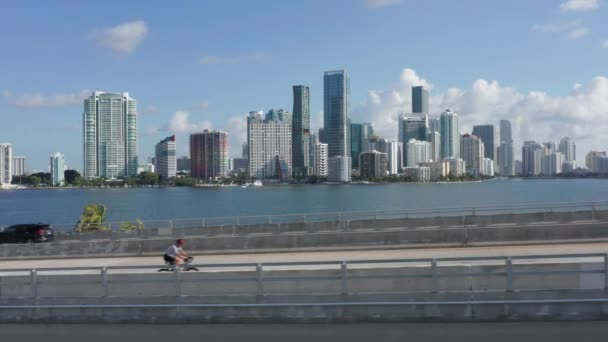 4K high bridge over the bay in Atlantic Ocean with cityscape on background — стокове відео