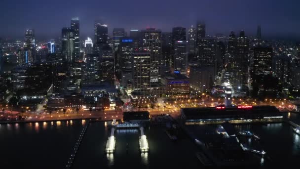 Cinematic aerial panorama of beautiful American city at the bay at night time 4K — Stock Video