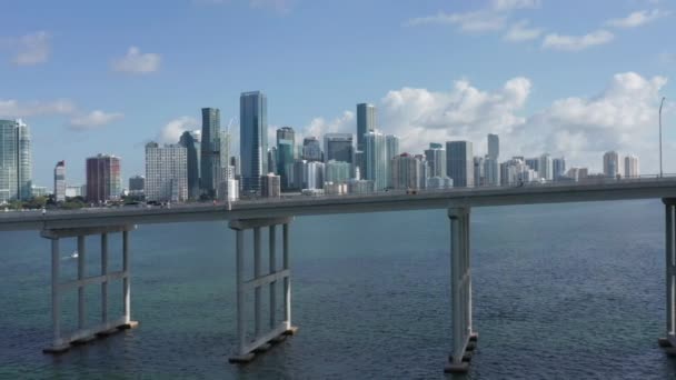 4K high bridge over the Miami harbor with cityscape on the background, Florida — стокове відео