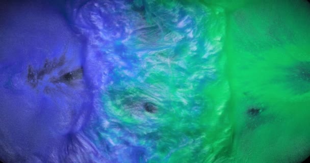緑と紫のインクが溶け合って美しい波を生み出しています — ストック動画