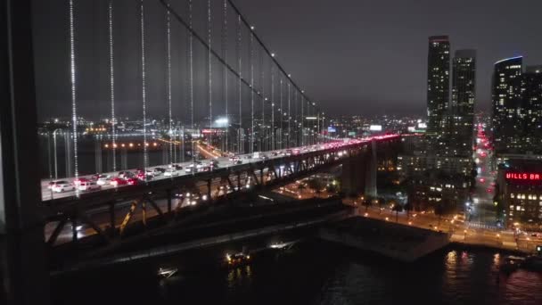 Epic aerial shot along the Oakland Bay Bridge towards the San Francisco downtown — Stock Video