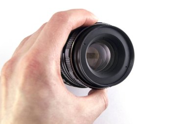 fotoğrafı elinde beyaz arka plan üzerinde objektif parlama