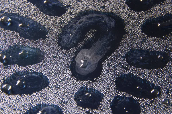 soru işareti üzerinde ıslak cam damla su yakın kadar doku