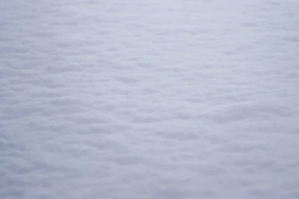 Achtergrond van verse sneeuw textuur in blauwe toon — Stockfoto