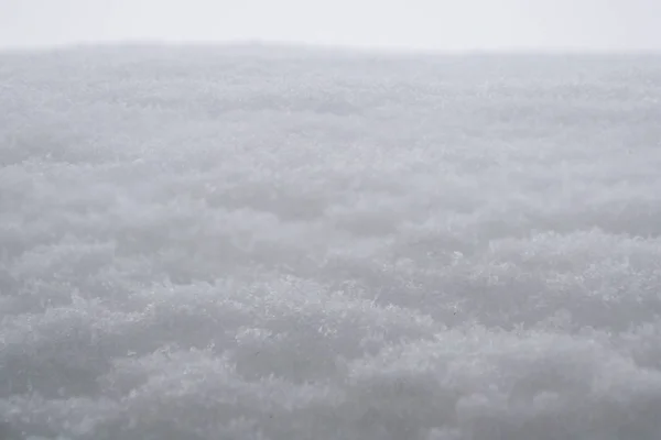 Superficie nevada como textura de fondo blanco día de invierno —  Fotos de Stock