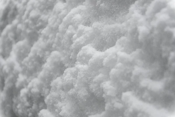 Wintersneeuw. Sneeuwtextuur Bovenaanzicht van de sneeuw. Textuur voor design. Sneeuwwitte textuur. Sneeuwvlokken. — Stockfoto