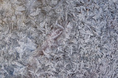 Snowflakes desen kış pencere camına güneş ışığı ile buz