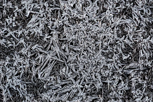 texture white frosty pattern on black glass seamless