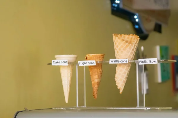 Ice cream cones on display in a gelato shop
