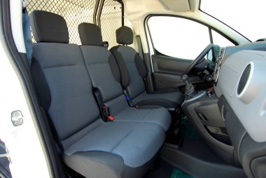 Front seats of a delivery car clipart