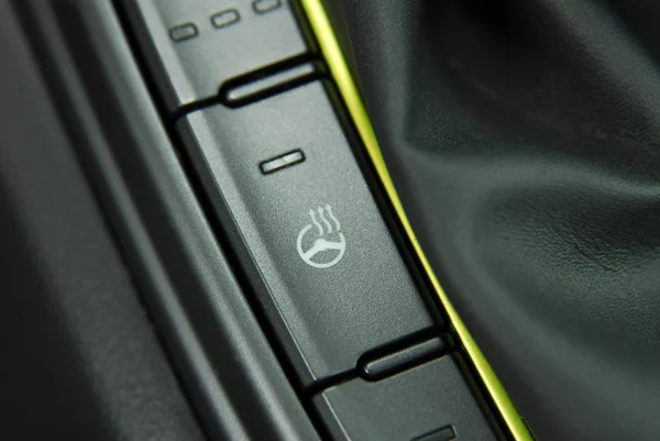 steering wheel heating button in the car