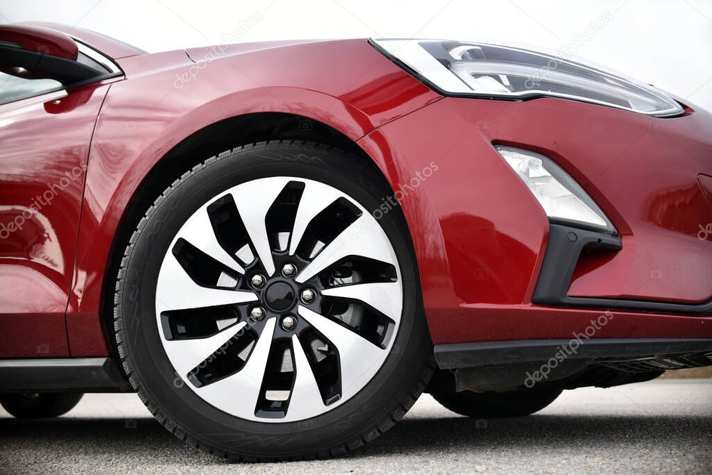 Tire and alloy wheel on this passenger car