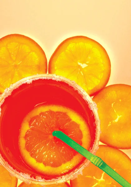 Orange drink in orange skin.