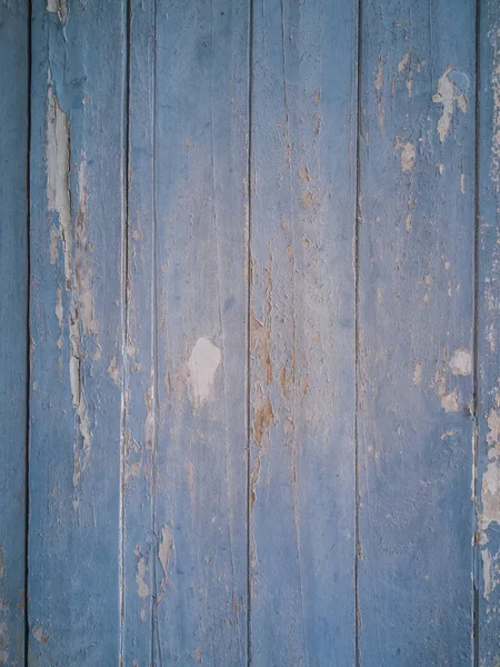 Blue painted wood floor and peeling off