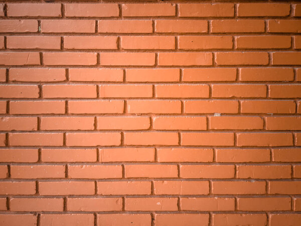 Beautiful red brick wall in the background / surface